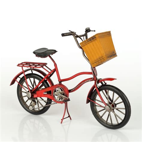 Ilustrácia bicykla s košíkom a batožinovým nosičom