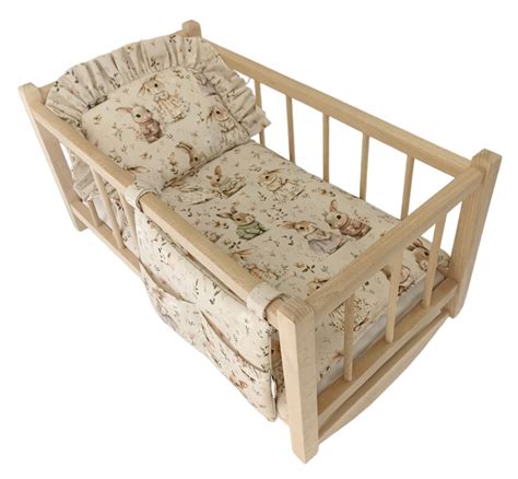 Drevená kolíska pre bábiky s posteľnou bielizňou