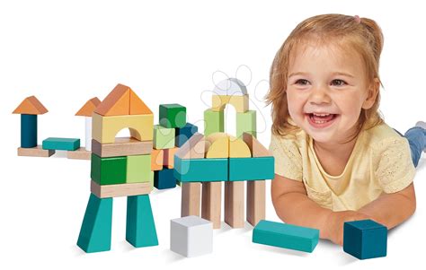 Ilustrácia dieťaťa, ktoré triedi farebné kocky