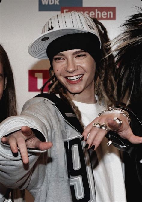 Tom Kaulitz hrajúci na gitare