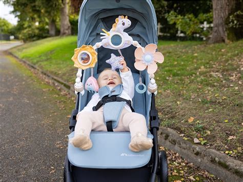 Hrazda Tiny Love pripevnená na kočík