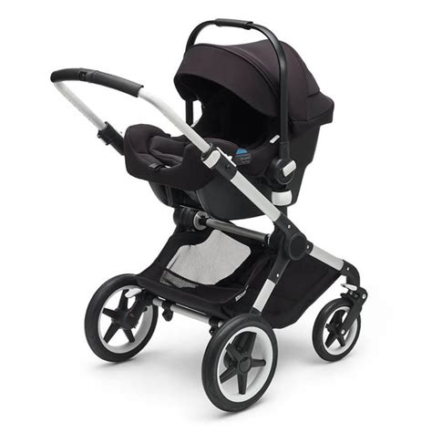 Detail klik systému na konštrukcii kočíka