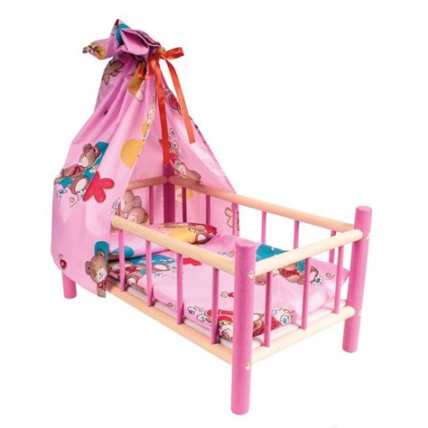 Drevená postieľka pre bábiku s bábikou